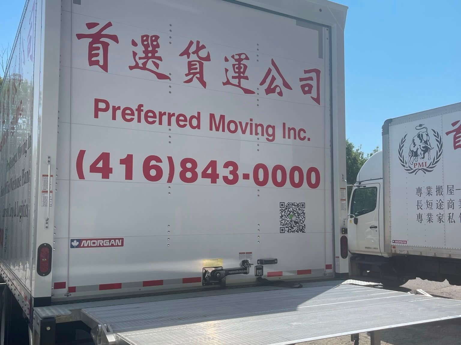 One of our moving trucks with the liftgate down, ready to load